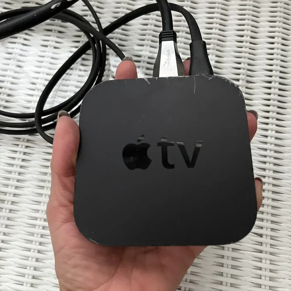 Apple TV 3rd generation HD media, model A1469, with power cable and HDMI cable
